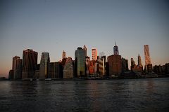 05 The First Rays Of Sunrise Shine On New York Financial District Skyline From Brooklyn Heights.jpg